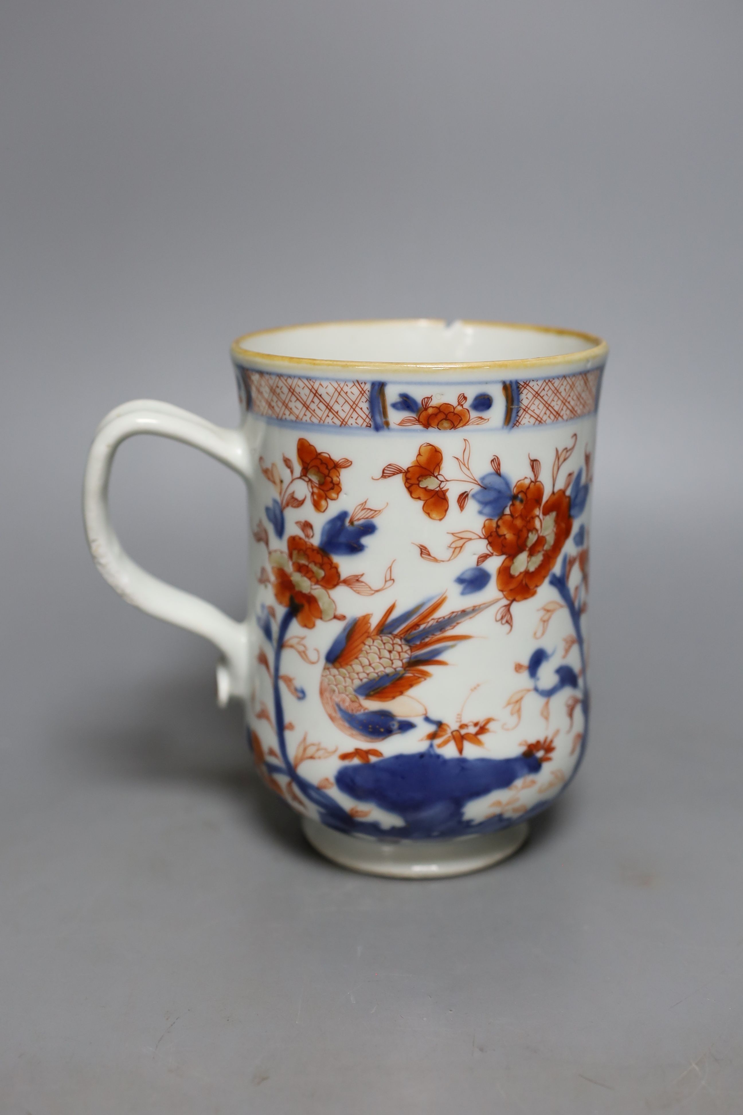 An 18th century Chinese blue and white dish, 30cm., and a Chinese Imari mug